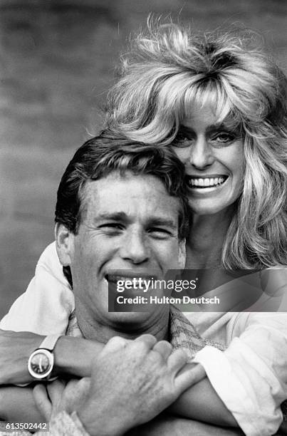 Ryan O'Neal and Farrah Fawcett.