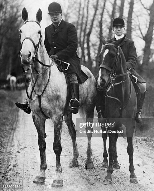 Mr. Winston Churchill , Chancellor of the Exchequer in Britain in the 1920s, and his son Randolph hunt for boar in the forests near Dieppe, France,...