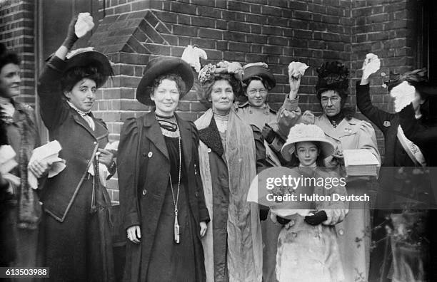 Emmeline Pankhurst and her daughter Christabel , the English suffragettes, with some of their supporters on their release from prison, 1908.