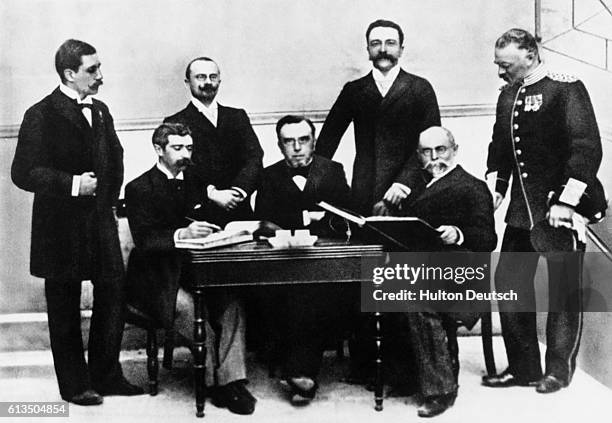 The first meeting of the International Olympic Committee, organized for the 1896 Olympic Games. They are, from left to right, Willabald Gebhardt of...
