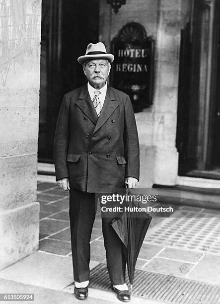 Sir Arthur Conan Doyle the detective novelist and creator of Sherlock Holmes, outside the Hotel Regina in Paris, 1925. He is in the city for the...
