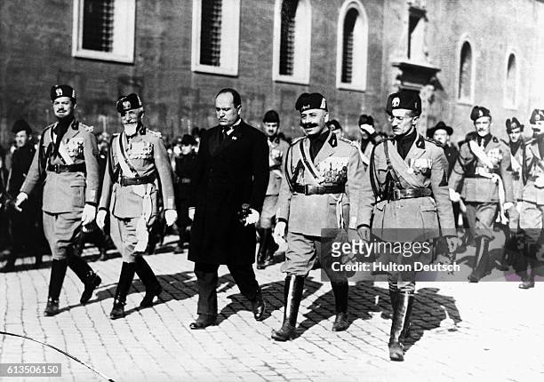 The Italian dicator Benito Mussolini and four of his Generals, march on Rome, supported by their fascist troops, 1922.