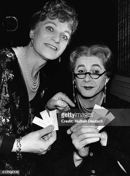 Female impersonators and comedians, Hinge and Bracket, guest at the Commuter Club draw, held in London's Globe Theatre.