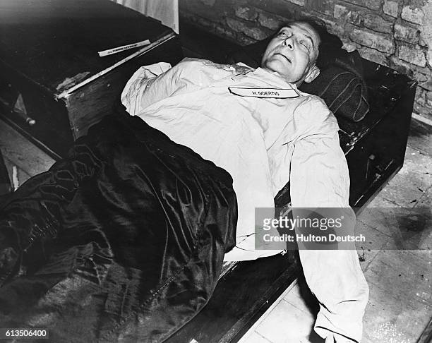 Hermann Wilhelm Goering , the German Third Reich's Field Marshal and commander of the German air force, lies dead on his bed after commiting suicide...