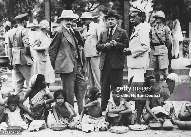 Lord Archibald Percival Wavell, the British vicory and governor-general of India, talks with Mr. J. K Biswas, the chairman of the Rotary Club Relief...