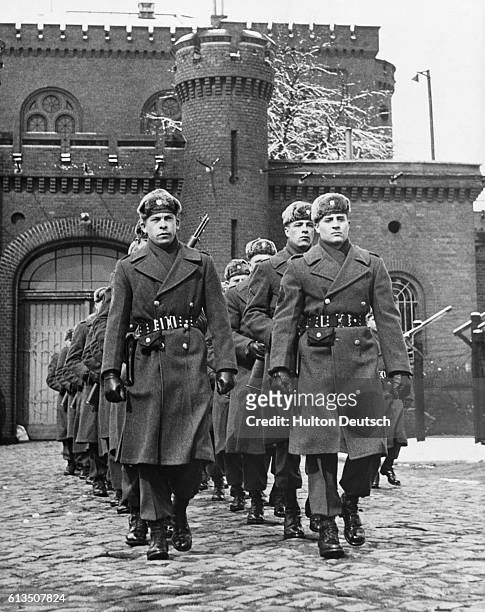 Russian guards on duty outside Spandau prison, where Rudolf Hess, Albert Speer, and Baldur Von Shirach are held.