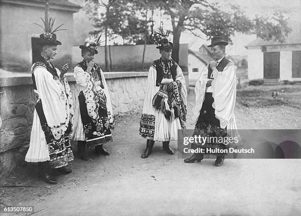 Peasants of Mezokovesda sport brightly embroidered local costume.