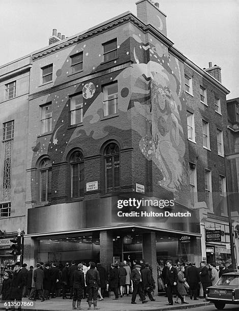 The new Apple Boutique, opened by the Beatles, on Baker Street is decorated with a 40-foot psychedelic mural which runs around both the exterior...