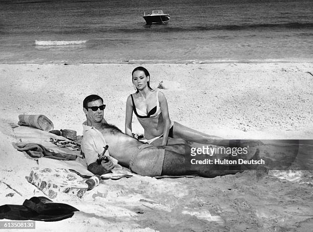British actor Sean Connery and Maryse Mitsuoko in the Bahamas in the most commercially successful Bond film 'Thunderball' in 1965.