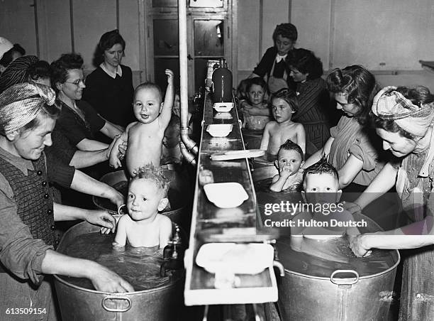 Due to a shortage of soap and fuel for heating water, huts with hot water and baths are open at Karlsdorf in the Russian zone just outside Berlin...