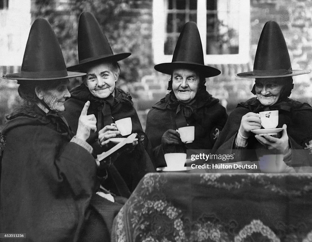 Four Elderly Women Having Tea