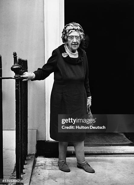 Agatha Christie the best selling detective novelist, arrives at the party organised by Collins her publishers, to celebrate the occassion of her 80th...