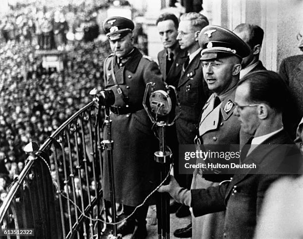 German Nazi leader and chief of police Heinrich Himmler, speaks from Town Hall in Linz, Austria, 1938.