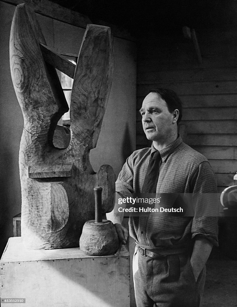 Henry Moore with Wood Carving