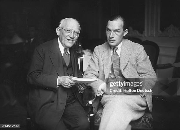 Mr Carl Laemmle, President of Universal Studios and German author Erich Maria Remarque, at a Berlin Hotel, in 1930