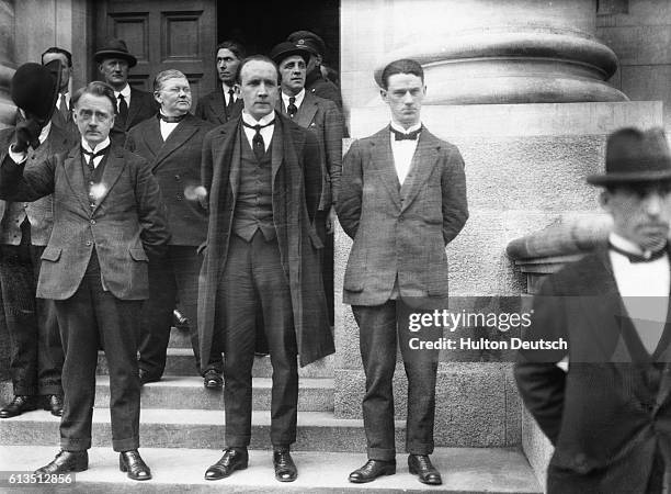 William Cosgrave, President of the Irish Free State with Civic Guard members Kevin O'Higgins and Commander O'Reilly.