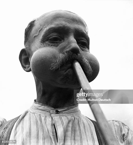 For 55 years Mr. George Windsor, aged 68, has been a glass blower. Glass blowing is a skilled job and although plenty of wind is needed, steady...