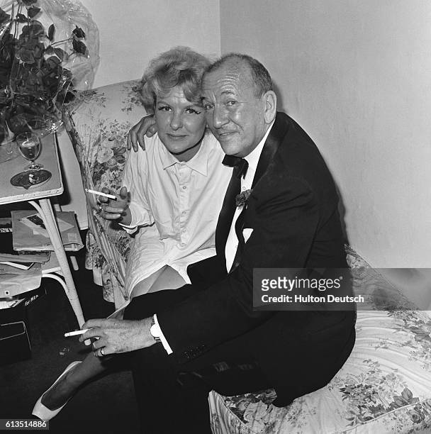 English playwright and actor Noel Coward with Elaine Stritch, ca. 1965.