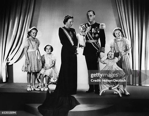 An official portrait of the Dutch Royal Family showing the newly inaugurated Queen Juliana, Prince Bernhard and their four daughters, 1948. Juliana...