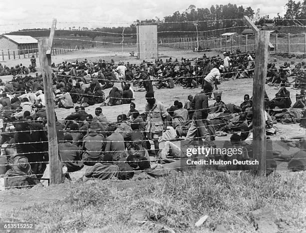 Kikuyu tribe members, held in an internment camp by the British government, during the Mau Mau Rebellion.