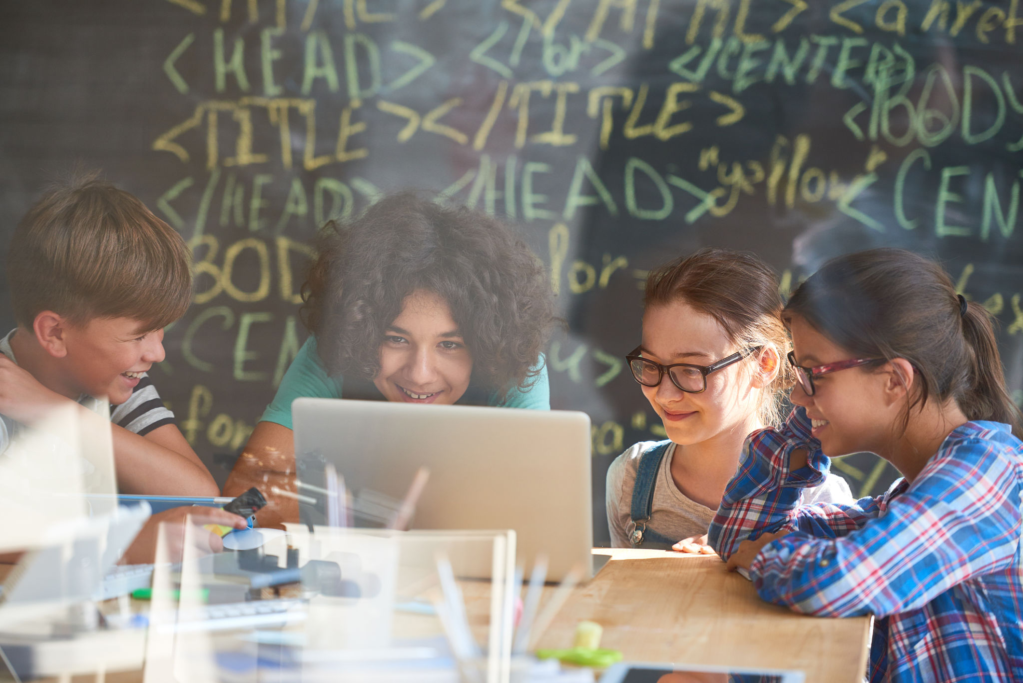 children coding on computers