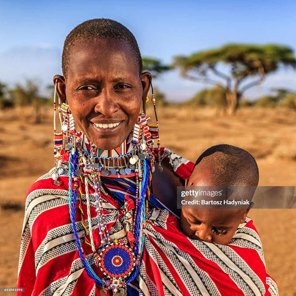African woman carrying her baby, Kenya, East Africa