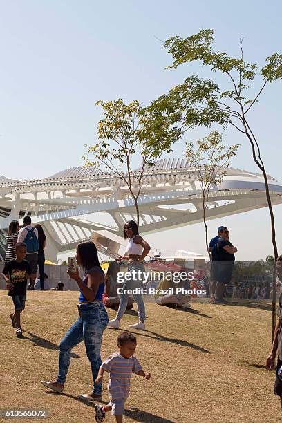 People enjoy the sunny day at Pier Maua next to the revitalized Praca Maua in Rio de Janeiro downtown, Brazil, a former degraded area of urban...