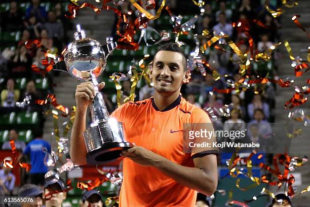 Nick Kyrgios of Australia poses with the trophy after winning the men's singles final match against David Goffin of Belgium on day seven of Rakuten...