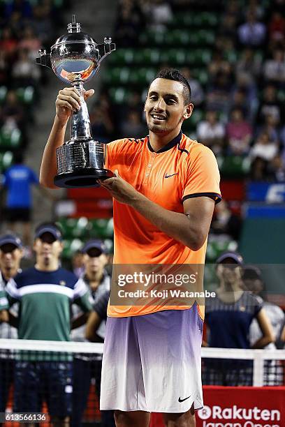 Nick Kyrgios of Australia poses with the trophy after winning the men's singles final match against David Goffin of Belgium on day seven of Rakuten...