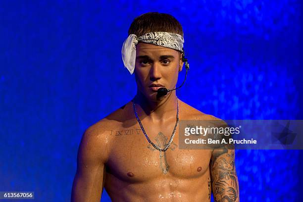 New 'wet look' Justin Bieber figure is unveiled at Madame Tussauds on October 9, 2016 in London, England.