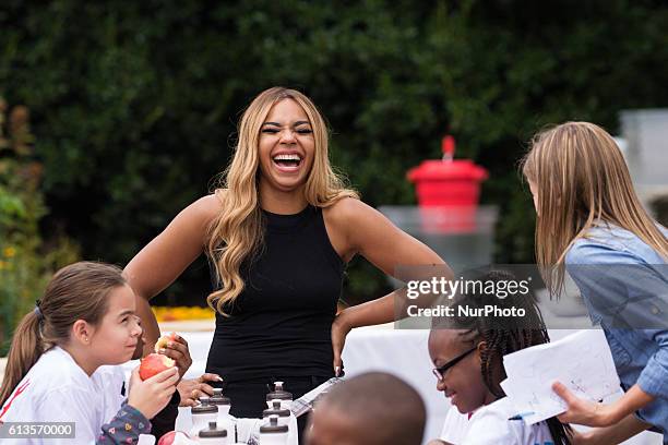 On Thursday, Oct. 6, Ashanti, Grammy Award Winning, Multi-Platinum Singer/Songwriter and Actress, was invited by First Lady Michelle Obama, to assist...