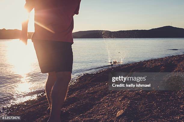 Skip Rocls Skipping Rocks At Lake Photos and Premium High Res Pictures - Getty Images