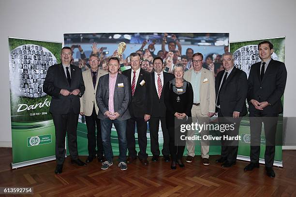 Reinhard Grindel poses with members of the Football Association of Rheinland during Club 100 & Fair Ist Mehr - Awarding Ceremony at Curio Haus on...