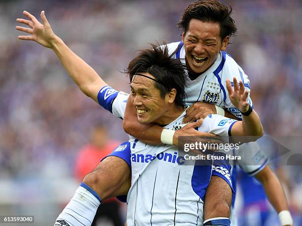 Yasuhiito Endo of Gamba Osaka celebrates scoring his team's first goal during the J.League Levain Cup semi final second leg match between Yokohama...
