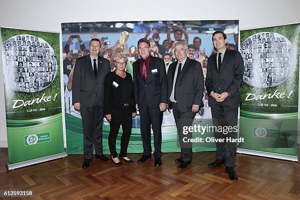 Reinhard Grindel poses with members of the Football Association of Bremen during Club 100 & Fair Ist Mehr - Awarding Ceremony at Curio Haus on...