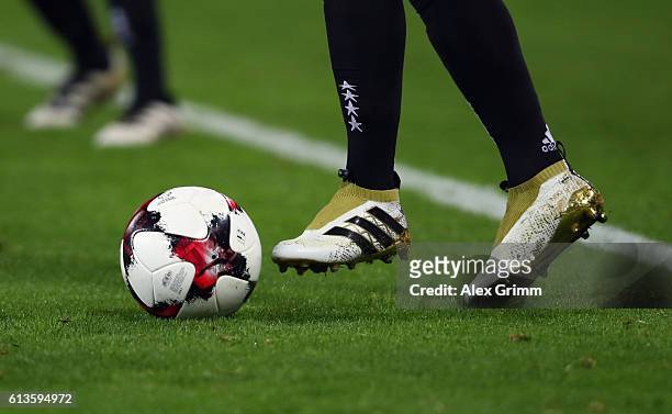 Detailed view of Mesut Oezil of Germany controlling the ball during the FIFA World Cup 2018 qualifying match between Germany and Czech Republic at...