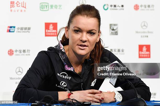 Agnieszka Radwanska of Poland attends a press conference after her victory against Johanna Konta of Great Britain during the Women's Singles final on...