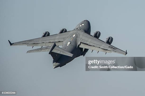 Air Force C-17 Globemaster III takes off from Fort Campbell, Kentucky, October 6, 2016. Joint Base Charleston C-17 Globemaster III's evacuated to...