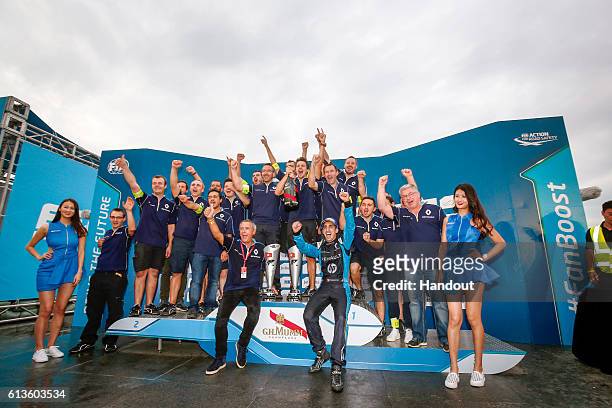 In this handout image supplied by Formula E, the Renault e.dams team celebrate on the podium with Sebastien Buemi , Renault e.Dams, Spark-Renault,...
