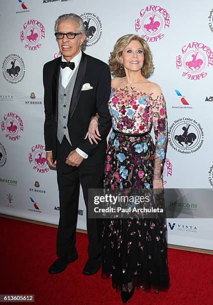 Actress Jane Fonda and Music Producer Richard Perry attend the 2016 Carousel Of Hope Ball at The Beverly Hilton Hotel on October 8, 2016 in Beverly...