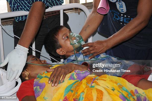 Injured people admitted at Lok Bandhu Hospital after stampede during the rally of Bahujan Samaj Party Supremo Mayawati on the tenth death anniversary...