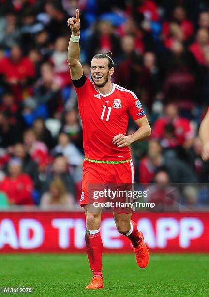 Gareth Bale of Wales celebrates his sides first goal during the 2018 FIFA World Cup Qualifier between Wales and Georgia at the Cardiff City Stadium...