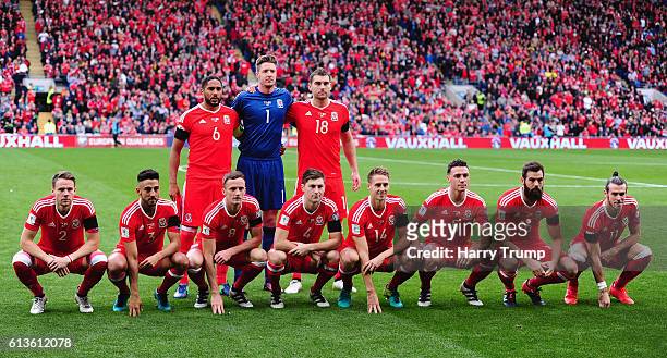 The Wales team pose for a photograph during the 2018 FIFA World Cup Qualifier between Wales and Georgia at the Cardiff City Stadium on October 9,...