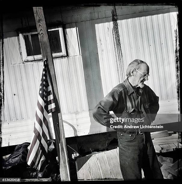 Ed Bailey stands outside of his trailer on March 25, 2016 on the Sullivan and Ulster County border in the town of Denning, New York. The Bailey...