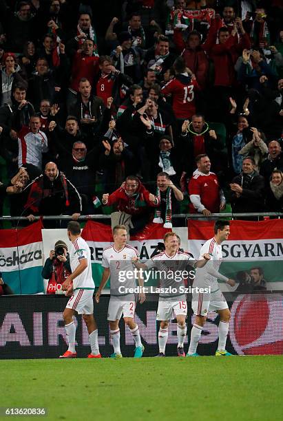 Adam Szalai of Hungary celebrates his goal with Adam Lang of Hungary, Laszlo Kleinheisler of Hungary and Richard Guzmics of Hungary during the FIFA...