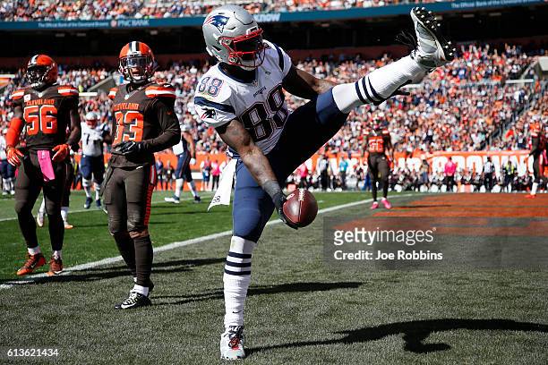 Martellus Bennett of the New England Patriots reacts after a seven-yard touchdown reception in the first quarter of the game against the Cleveland...