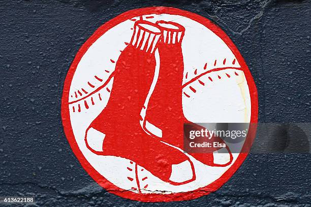 Raindrops are seen on the Boston Red Sox logo after game three of the American League Divison Series between the Boston Red Sox and the Cleveland...