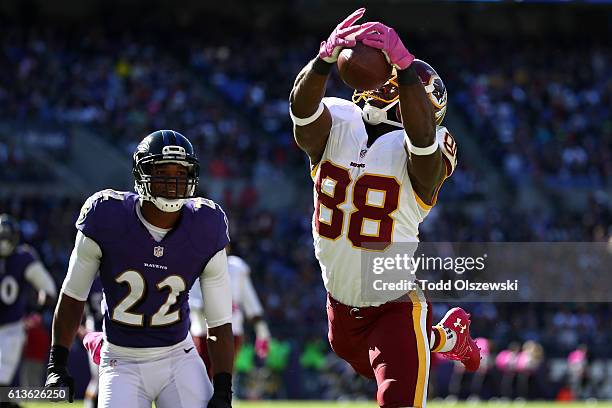 Wide receiver Pierre Garcon of the Washington Redskins catches a touchdown in the second half against the Baltimore Ravens at M&T Bank Stadium on...