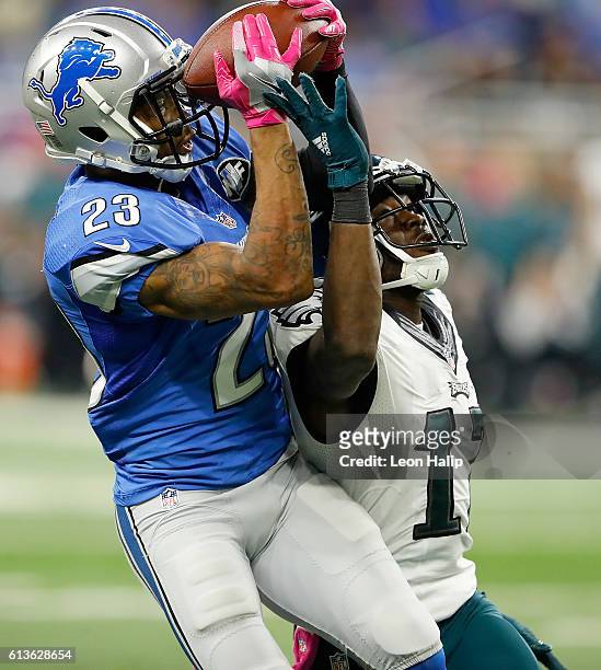 Darius Slay of the Detroit Lions intercepts a pass intended for Nelson Agholor of the Philadelphia Eagles in the final minutes of the game at Ford...