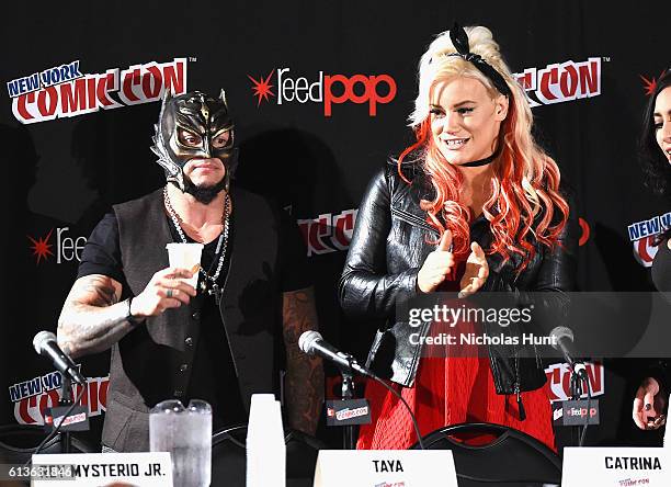 Rey Mysterio Jr. And Taya speak onstage at Lucha Underground Panel during 2016 New York Comic Con on October 9, 2016 in New York City.